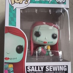 Funko Pop Sally Sewing with Red and Green Colors